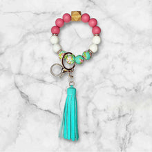 Load image into Gallery viewer, Teal and Pink Floral Silicone Beaded Wristlet