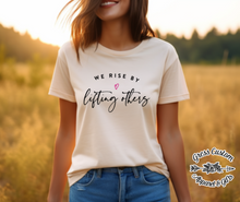 Load image into Gallery viewer, We Rise By Lifting Others T-Shirt
